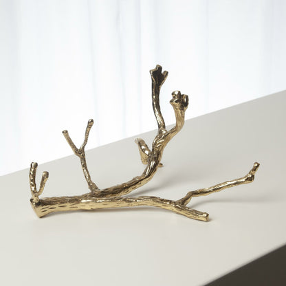 Twig Wine Bottle Holder by Global Views. Made from cast brass in a eclectic & global style.