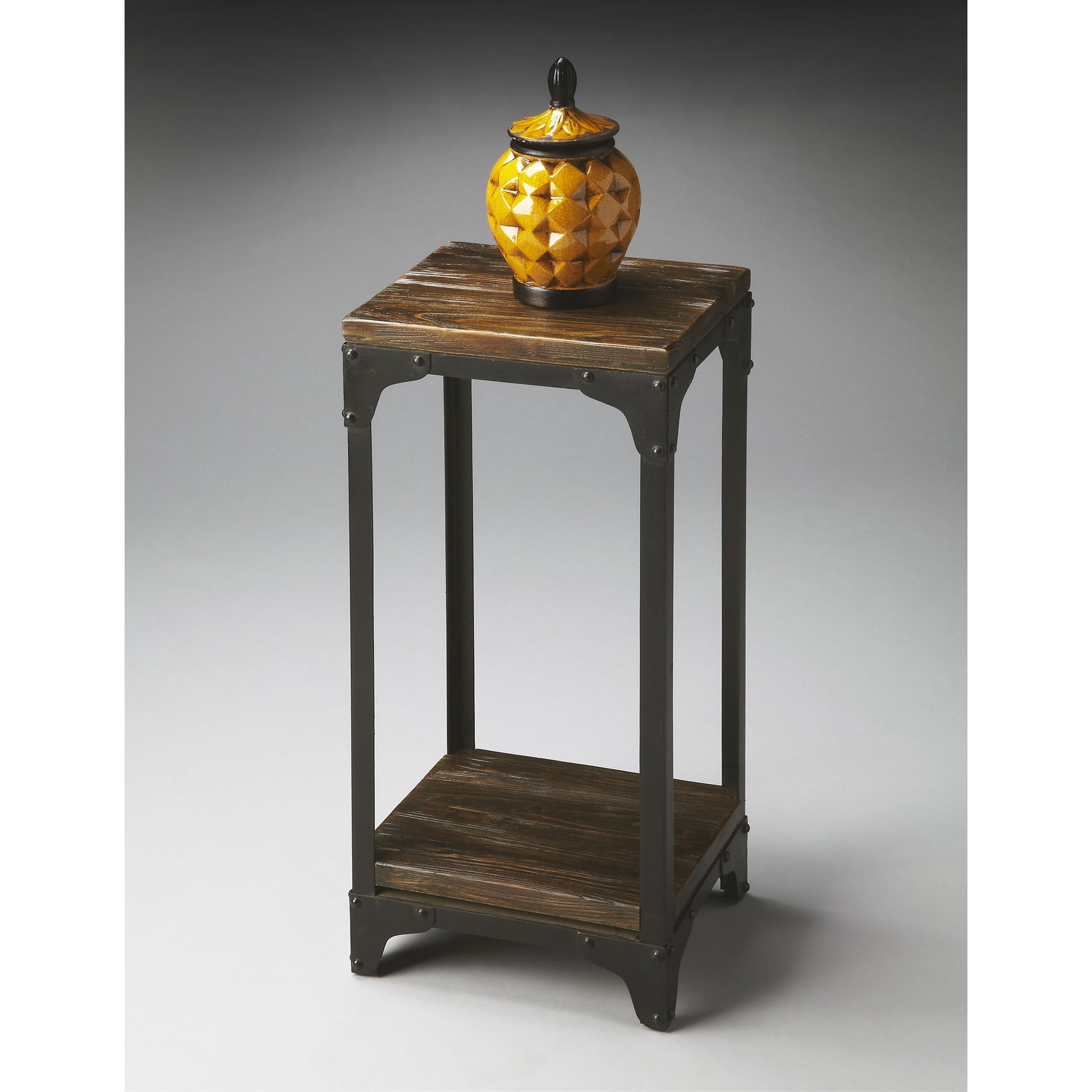 Gandolph Industrial Chic Pedestal Stand by Butler Specialty Company in multi-color and mountain lodge. Made from iron, mango wood solids in a modern style.