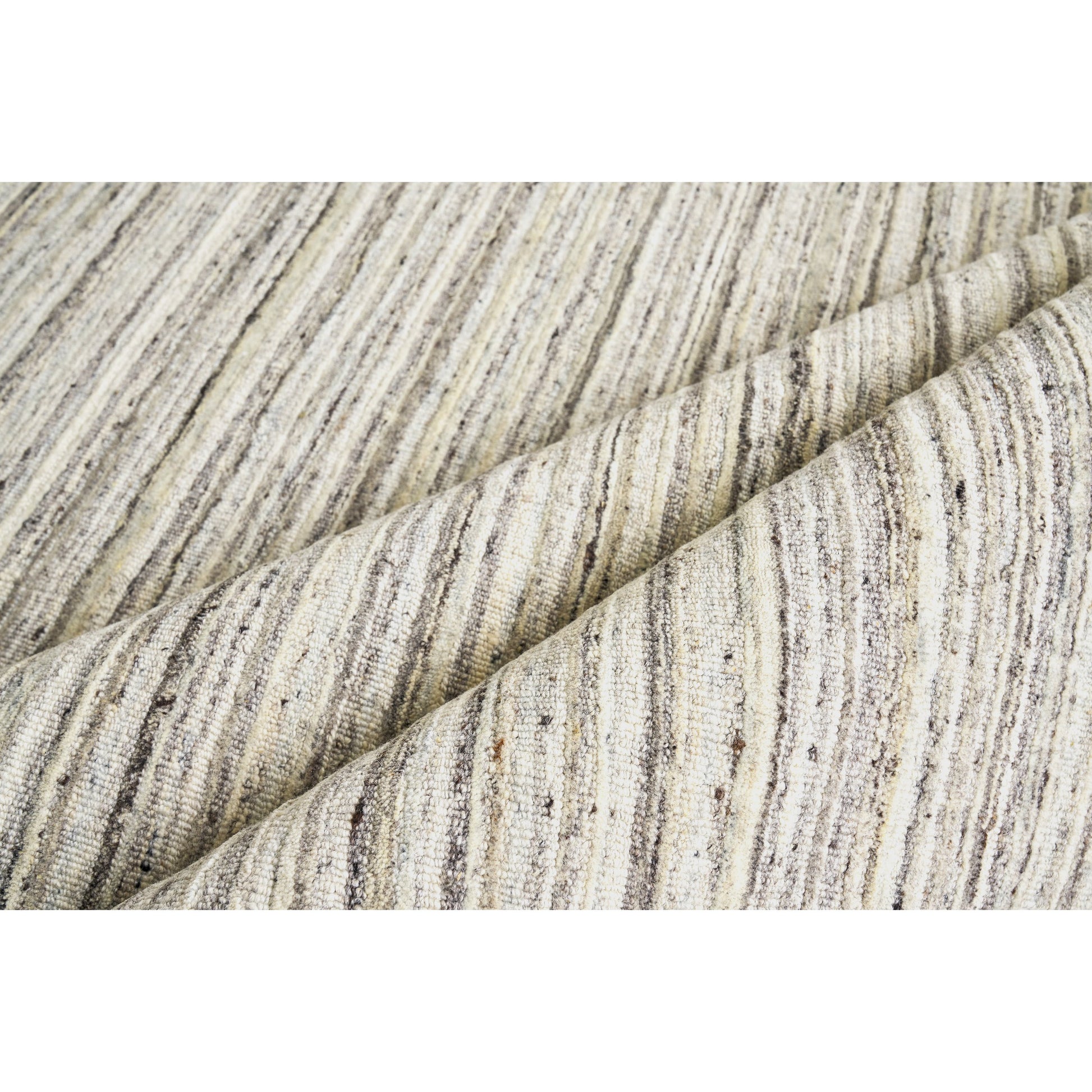 Organica Rug by Exquisite Rugs in charcoal, silver. Made from new zealand wool in a unique style.