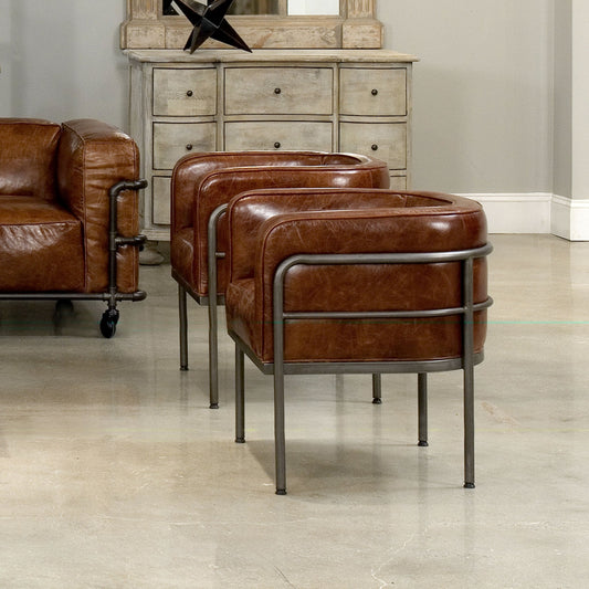 Breda Chair by Sarreid Ltd. in brown and iron aged metal finish. Made from leather, iron in a modern style.