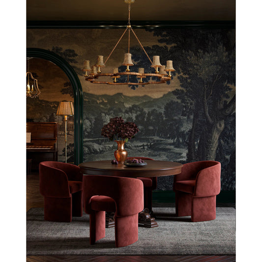 Savoie Chandelier by Currey and Company in natural, contemporary gold leaf. Made from rattan, wrought iron in a unique style.