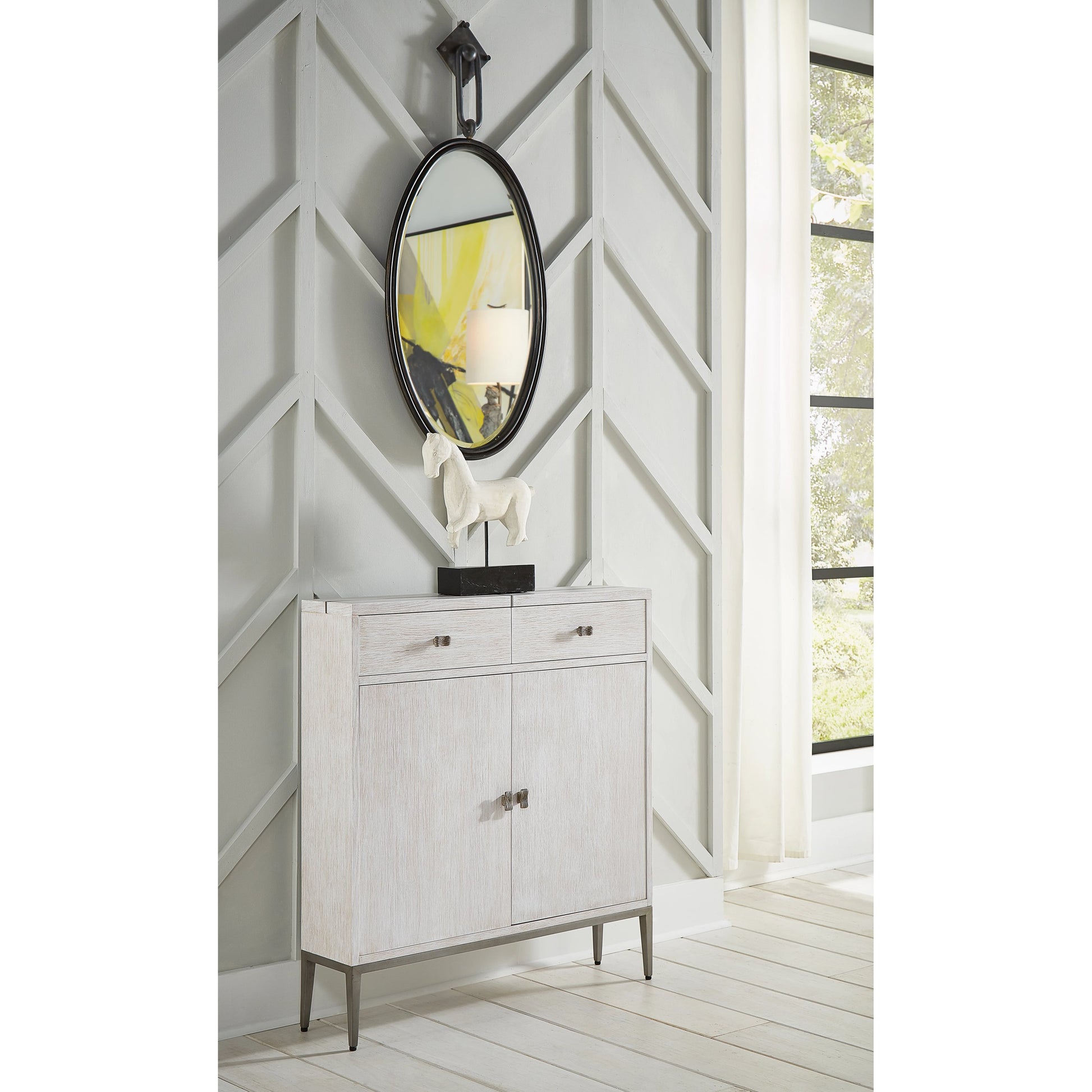 Tobago Oval Bronze Wall Mirror by Wildwood in bronze, beveled, clear. Made from iron, mirror in a transitional style.