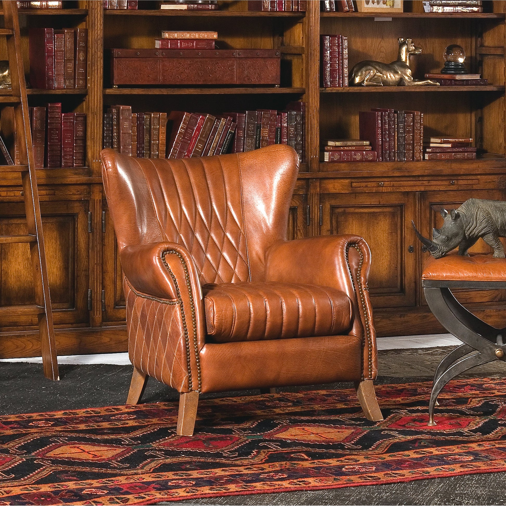 Bugatti Arm Chair by Sarreid Ltd. in brown and brown leather. Made from wood, leather in a modern style.