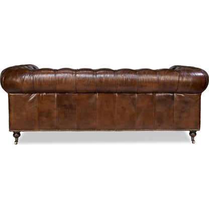 Castered Chesterfield Sofa by Sarreid Ltd. in vintage havana. Made from wood, leather in a traditional style.