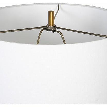Monolith Table Lamp by Uttermost in pewter gray, antique brass. Made from ceramic, iron, fabric in a transitional style.