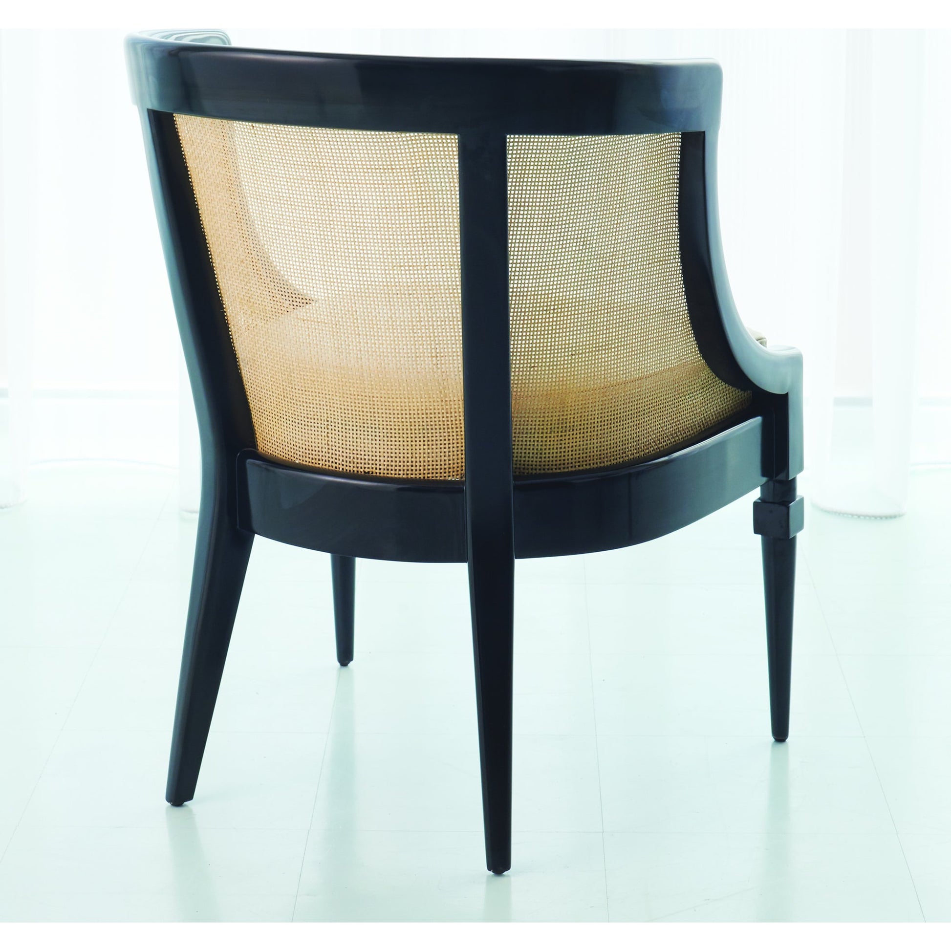Cane Chair by Global Views in black satin lacquer, natural color antique, matte lacquer. Made from alder, natural antique in a traditional style.