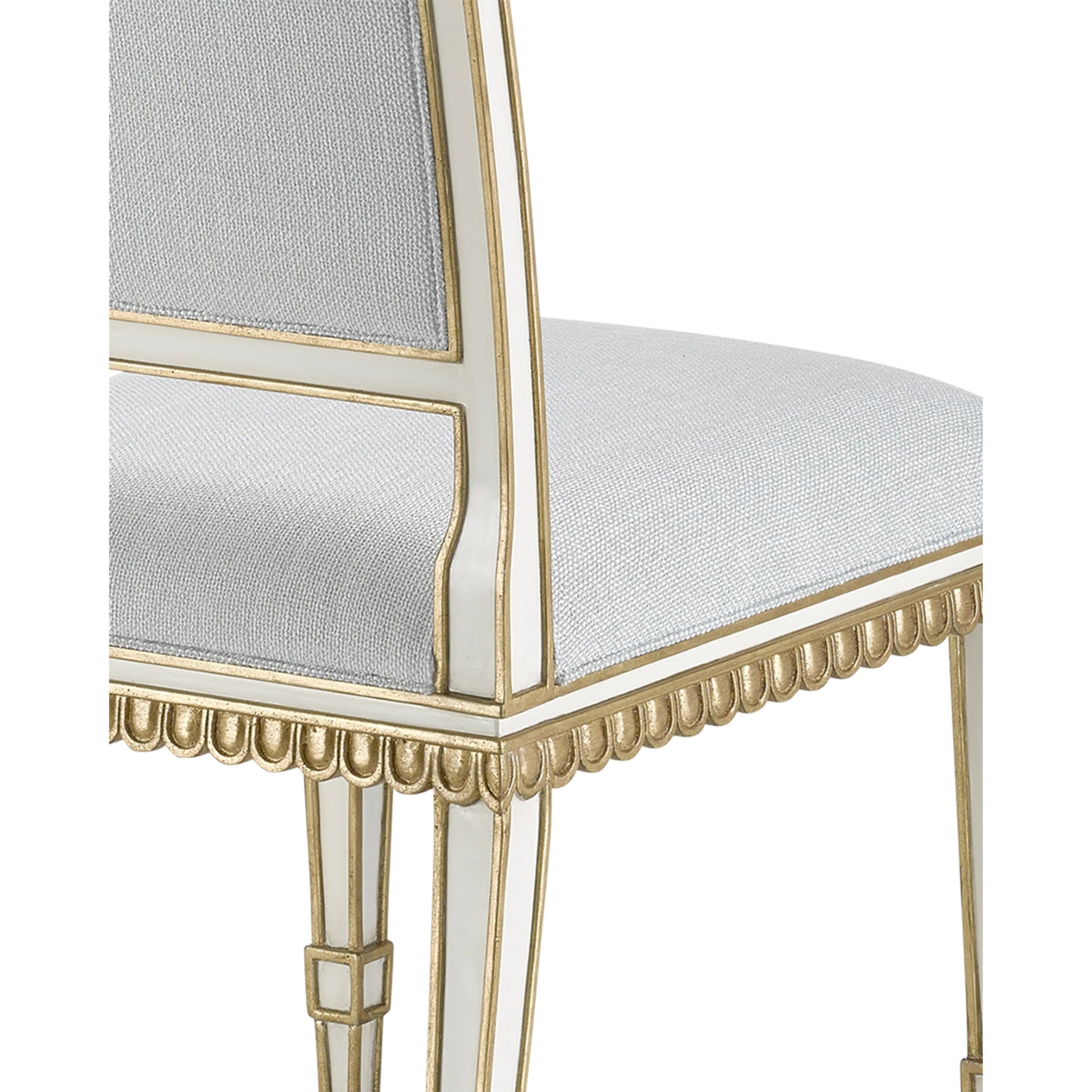 Ines Chair by Currey and Company in mixology moonstone and ivory, antique gold. Made from mahogany in a transitional style.