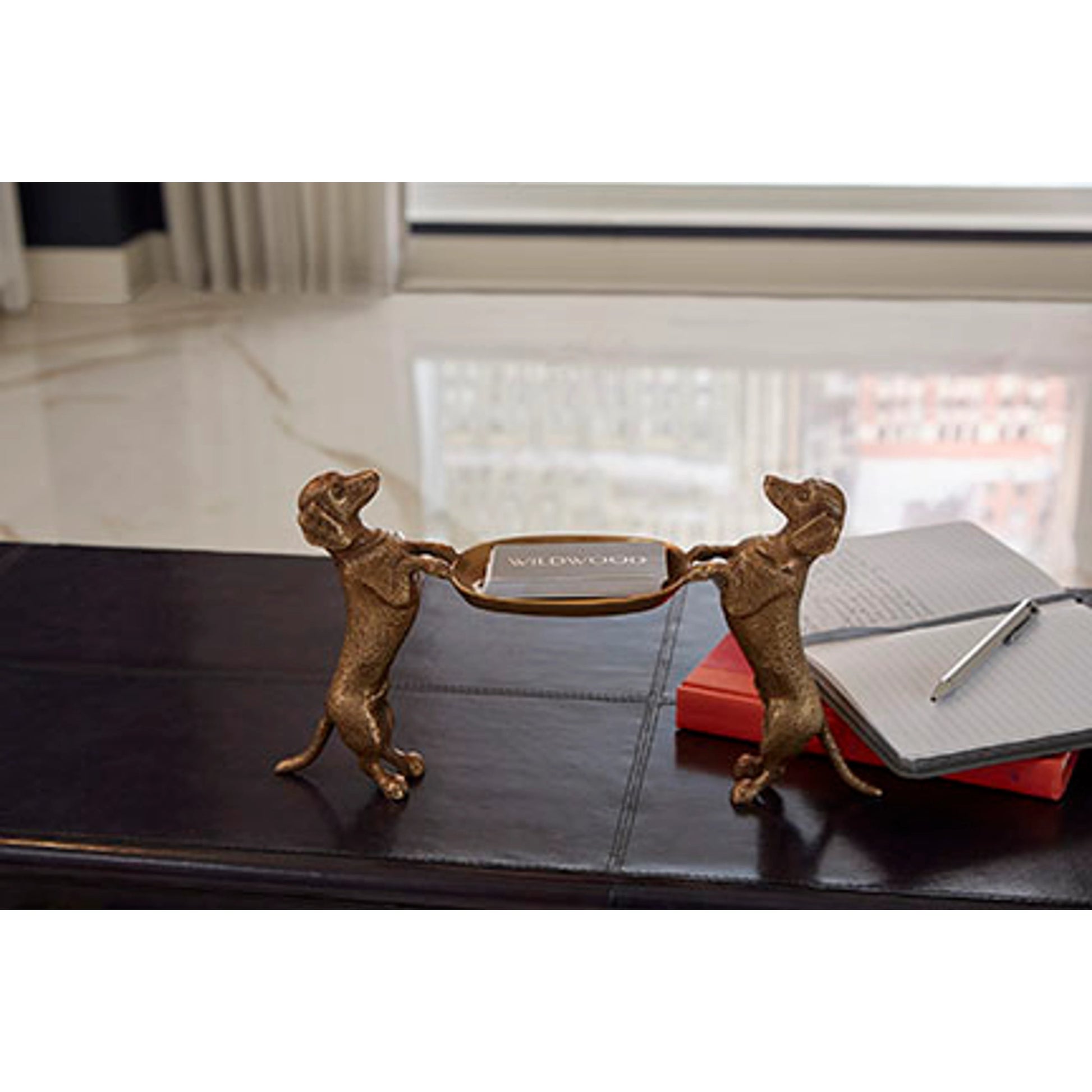 Dogs Bearing Dish by Wildwood in antique, bronze patina. Made from solid brass in a rustic style.