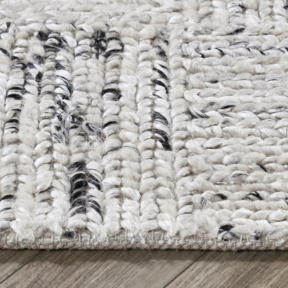 Sosa Abstract Wool Blend Area Rug by Villa by Classic Home in ivory, black. Made from 60% wool, 25% jute, 15% cotton in a unique style.