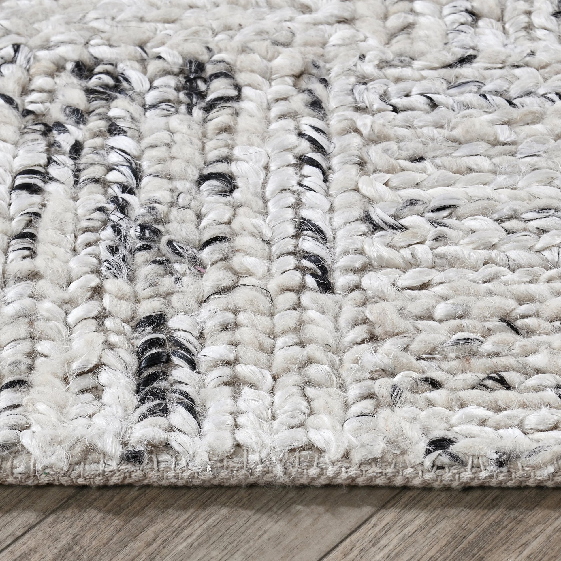 Sosa Abstract Wool Blend Area Rug by Villa by Classic Home in ivory, black. Made from 60% wool, 25% jute, 15% cotton in a unique style.