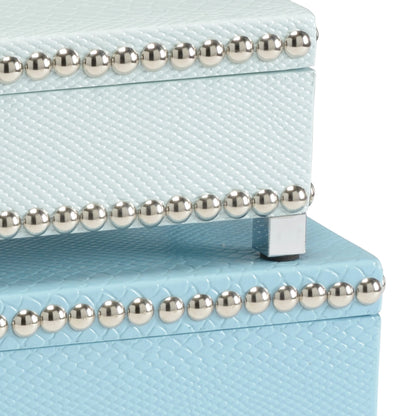 Treasure Boxes by Wildwood. Made from faux cobra skin, metal in a transitional style.