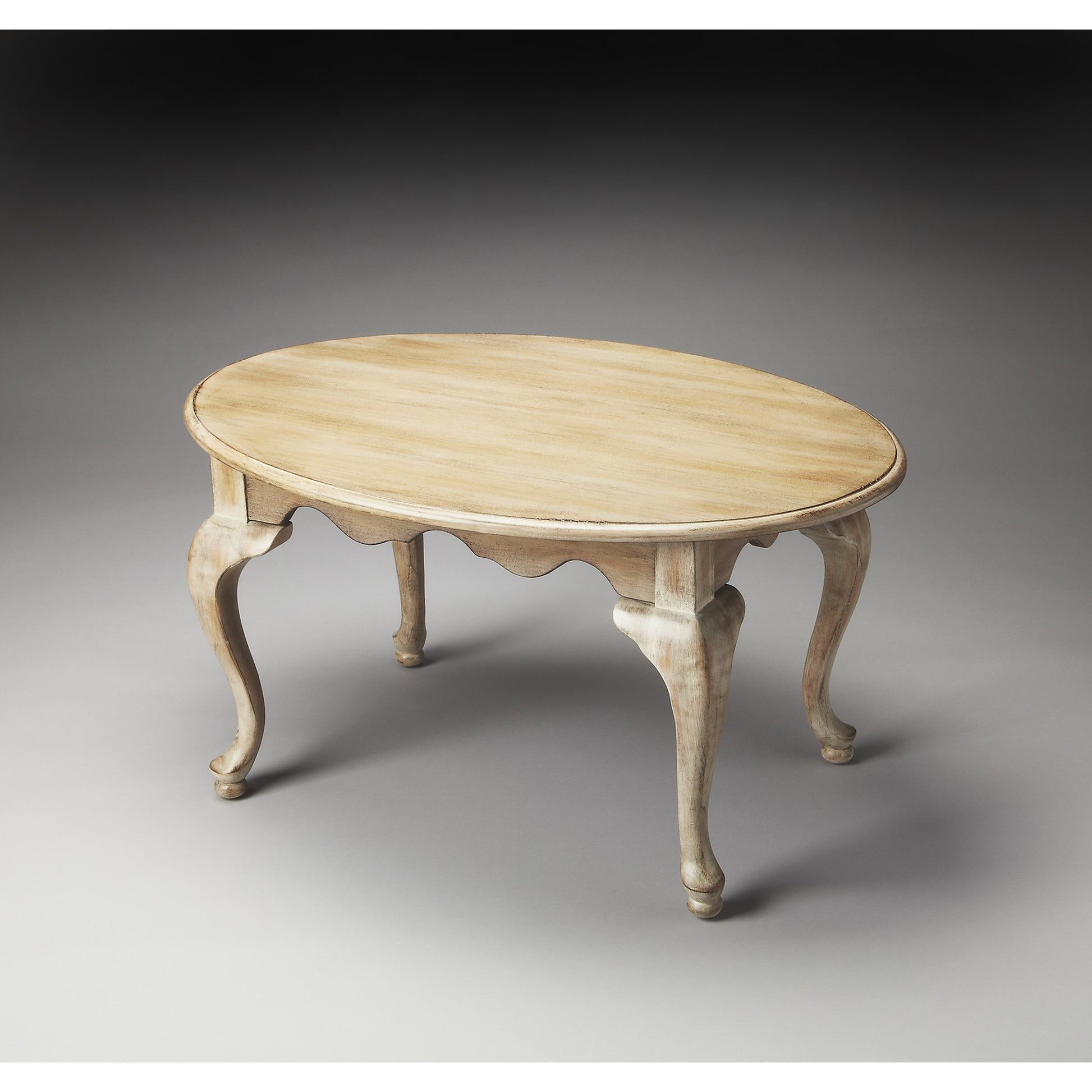 Grace Oval Cocktail Table by Butler Specialty Company. Made from rubberwood solids, mdf, cherry, maple, walnut veneers in a traditional style.