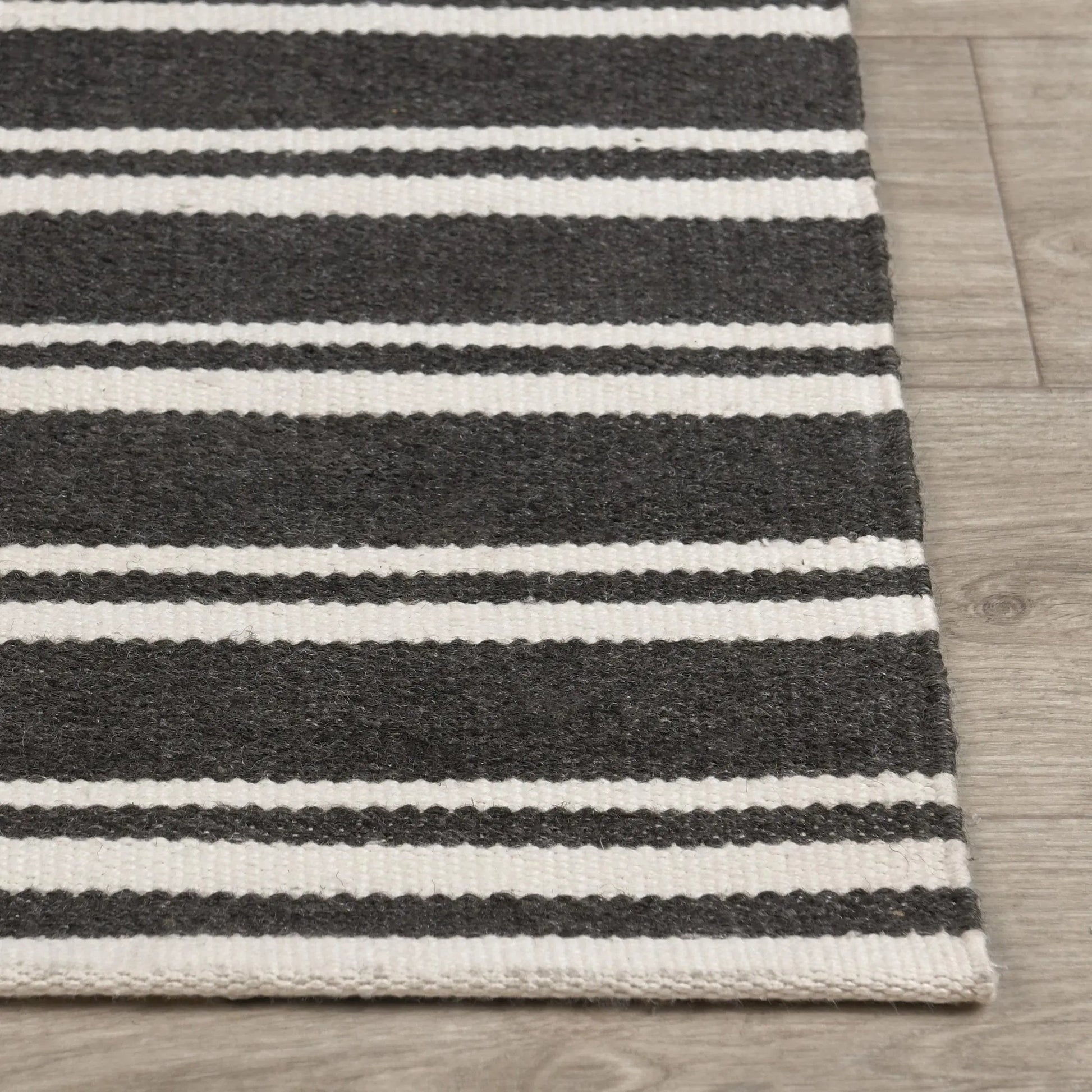 Palma Stripe Fabric Rug by Villa by Classic Home. Made from 100% pet yarn in a unique style.