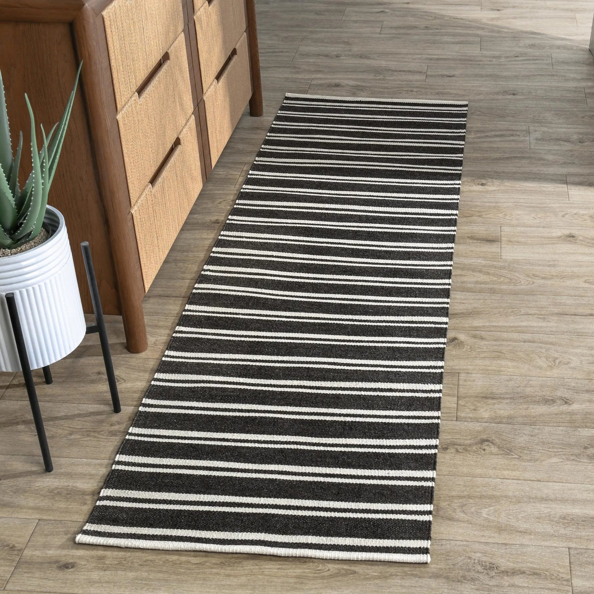 Palma Stripe Fabric Rug by Villa by Classic Home. Made from 100% pet yarn in a unique style.