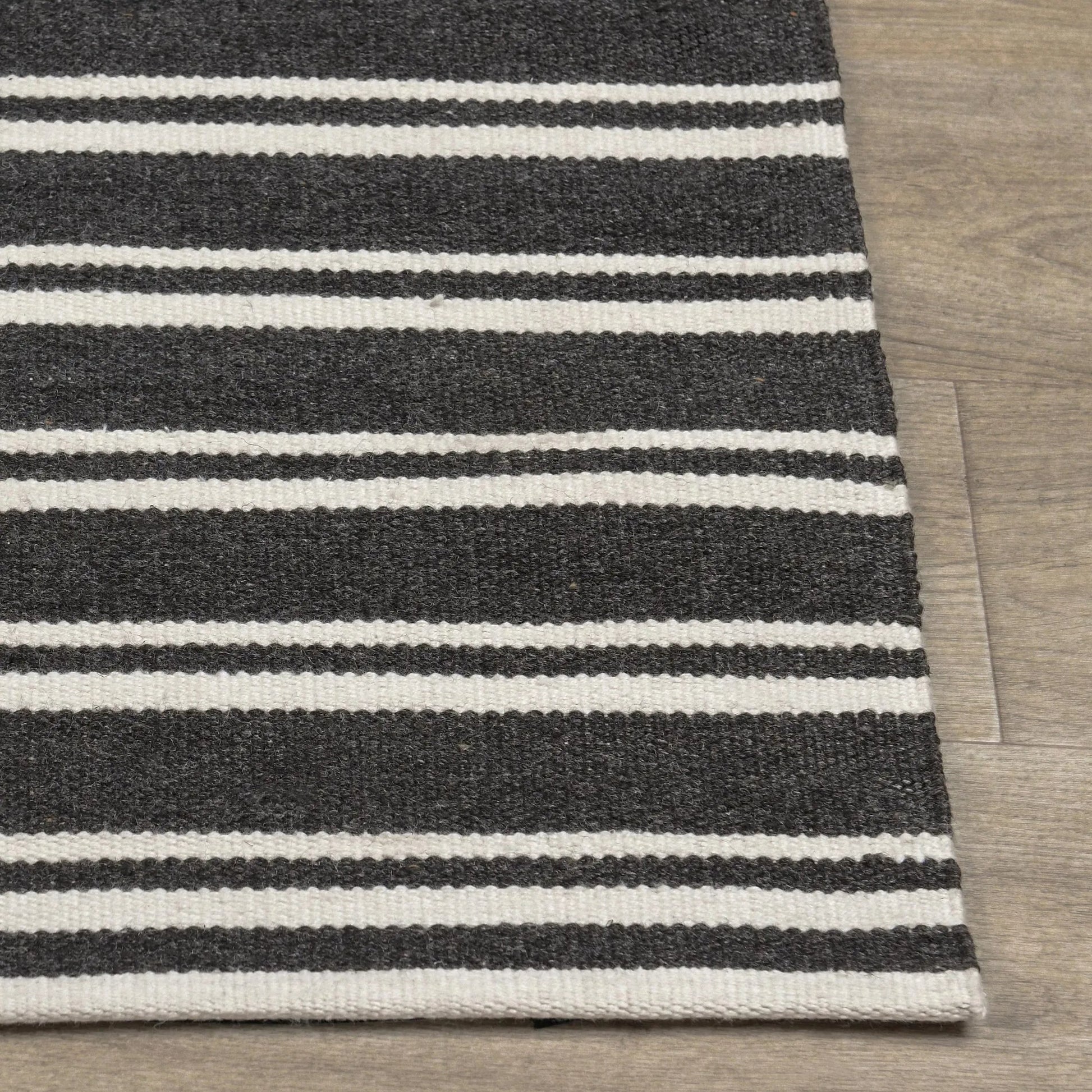Palma Stripe Fabric Rug by Villa by Classic Home. Made from 100% pet yarn in a unique style.