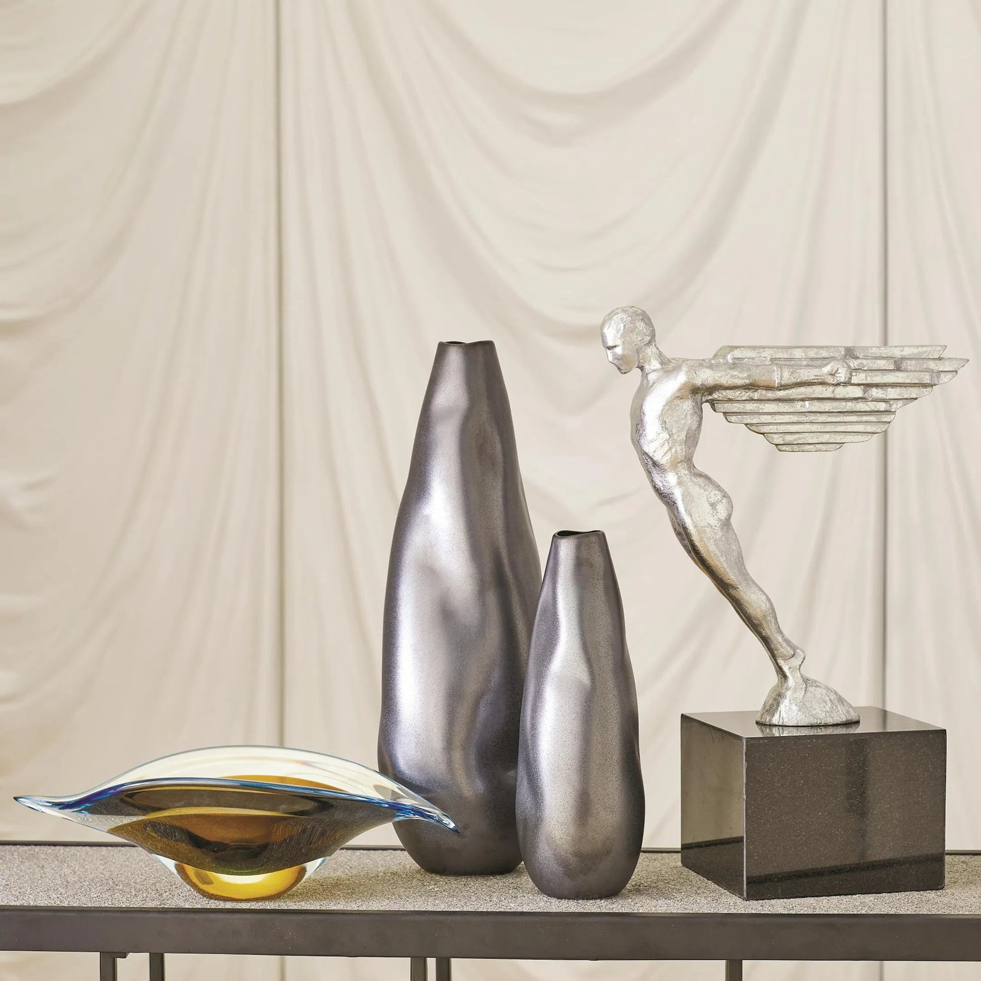 Bent Leaf Bowl by Global Views. Made from art glass in a unique style.