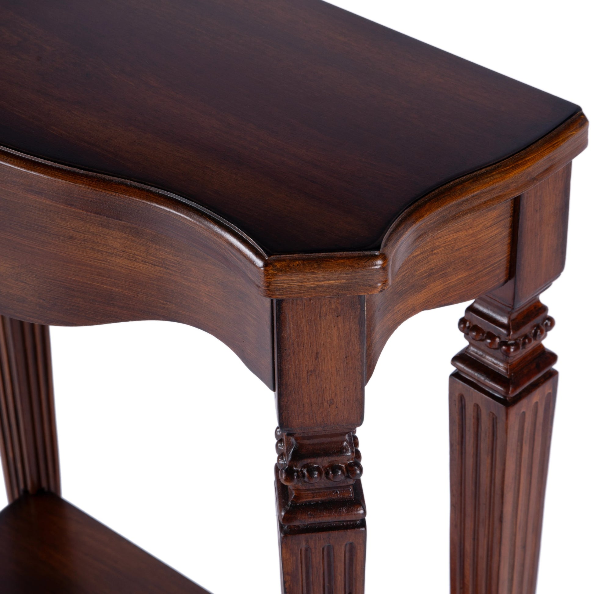 Cheshire Console Table by Butler Specialty Company. Made from poplar, resin, cherry veneer and fiberboard in a traditional style.
