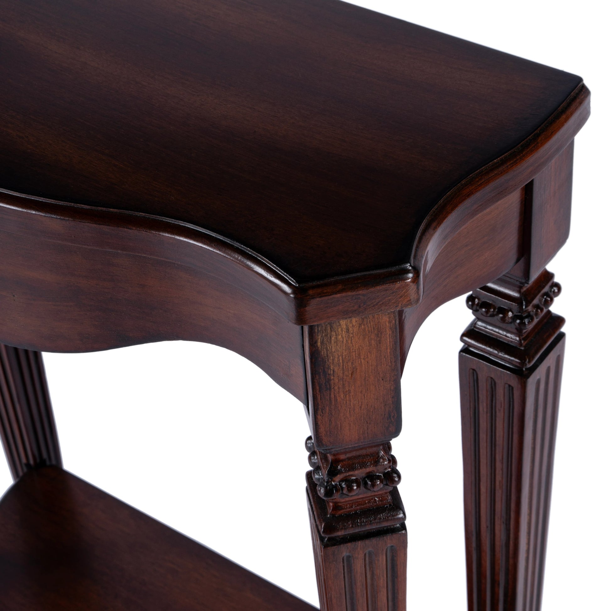 Cheshire Console Table by Butler Specialty Company. Made from poplar, resin, cherry veneer and fiberboard in a traditional style.