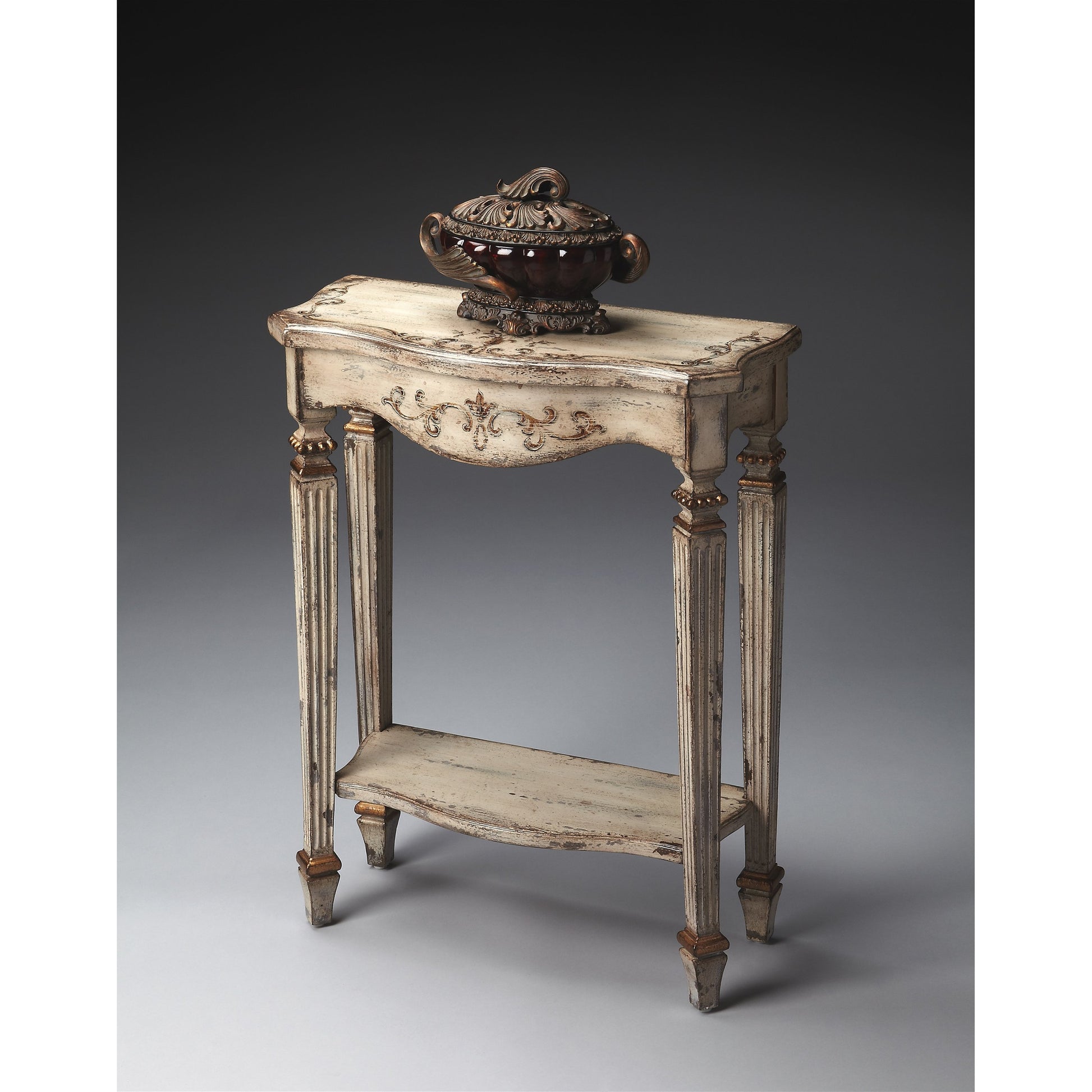 Cheshire Console Table by Butler Specialty Company. Made from poplar, resin, cherry veneer and fiberboard in a traditional style.