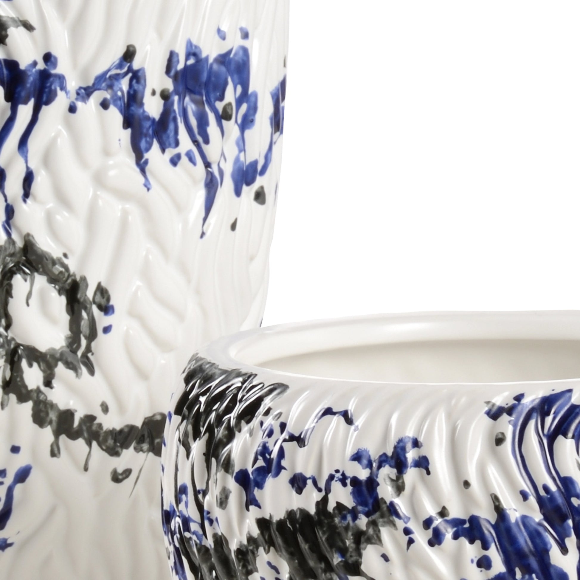 Pollock Vases by Wildwood in matte white, black, blue glaze. Made from ceramic in a modern style.