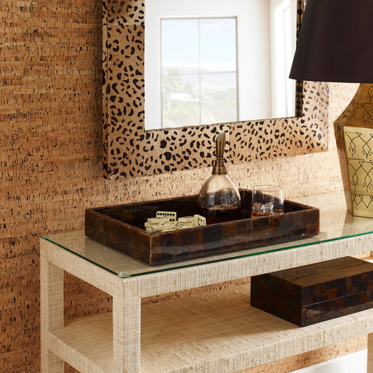 Sabor Mirror by Wildwood in brown, black. Made from hair on hide, wood, mirror in a modern style.