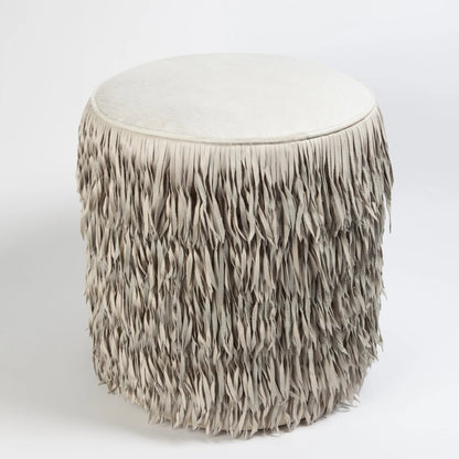 Fringe Ottoman by Global Views. Made from mdf, leather, pvc in a unique style.