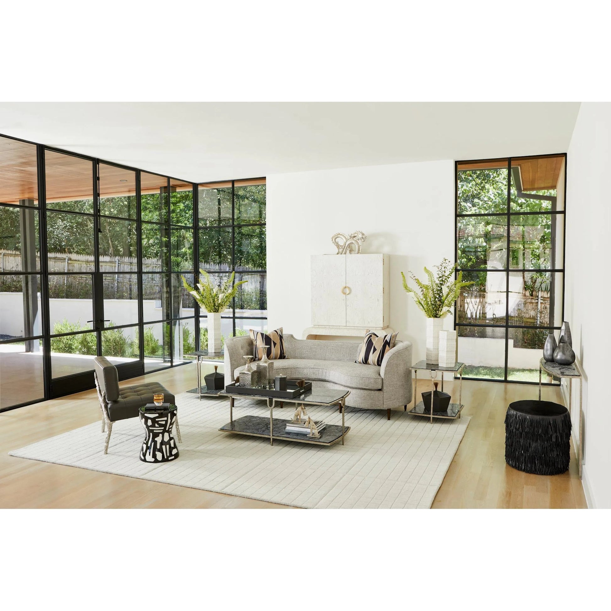 Fringe Ottoman by Global Views. Made from mdf, leather, pvc in a unique style.