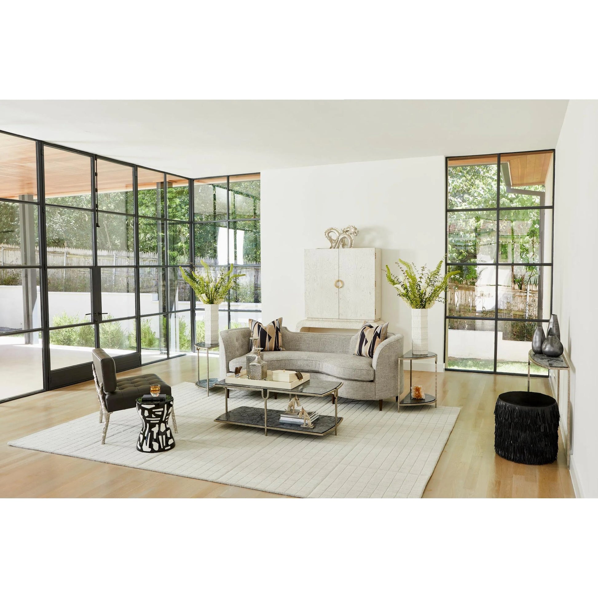 Fringe Ottoman by Global Views. Made from mdf, leather, pvc in a unique style.