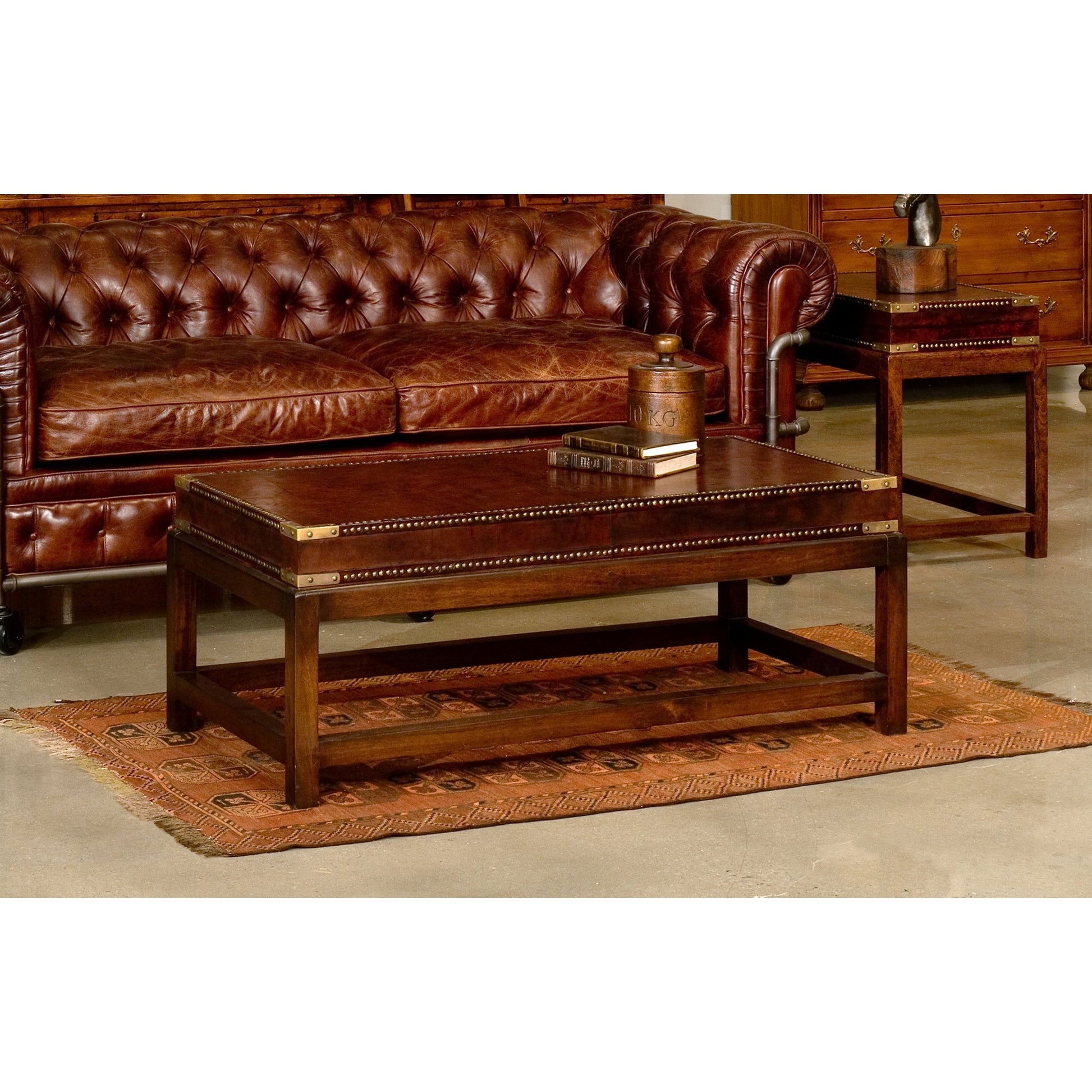 Winchester Coffee Table by Sarreid Ltd. in brown. Made from wood, leather in a cottage & farmhouse style.