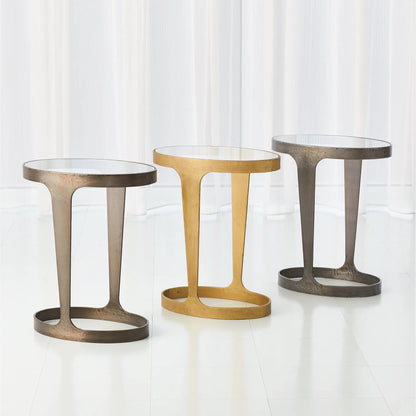 Oslo Accent Table by Global Views in gold. Made from iron, tempered glass in a eclectic & global style.