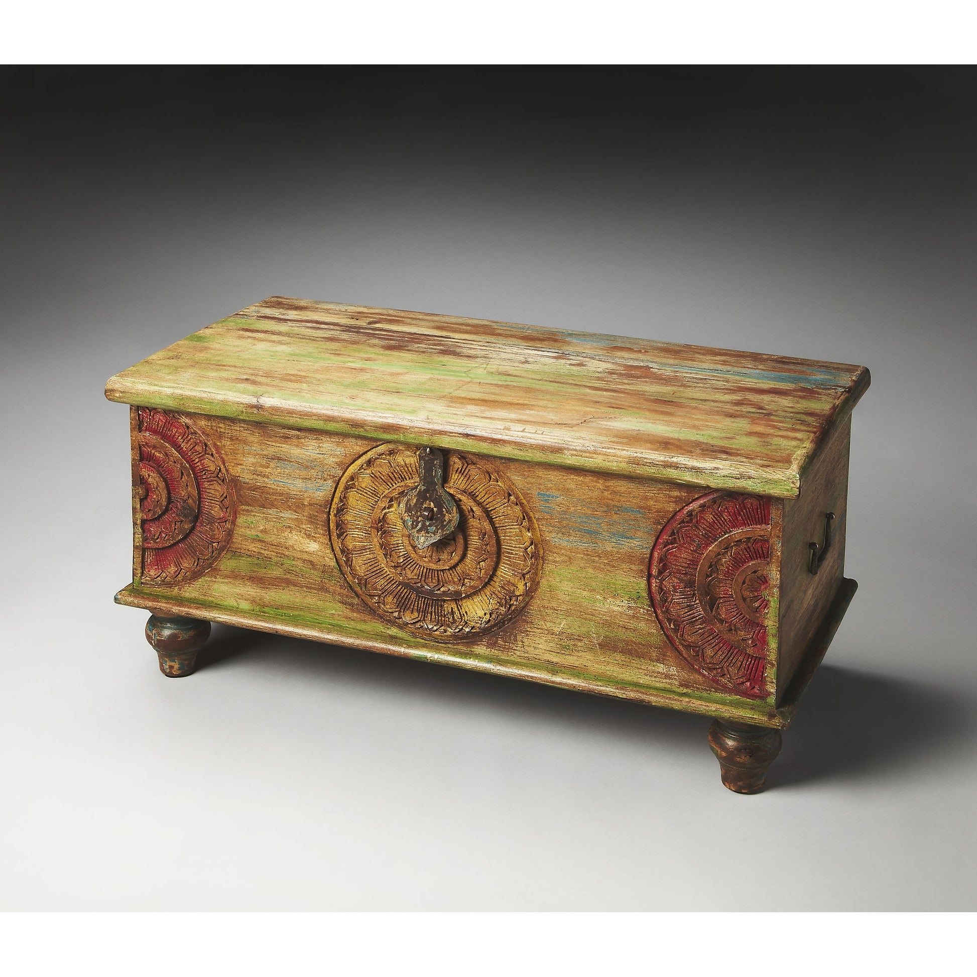 Mesa Carved Wood Trunk Cocktail Table by Butler Specialty Company in assorted and artifacts. Made from wood in a coastal style.