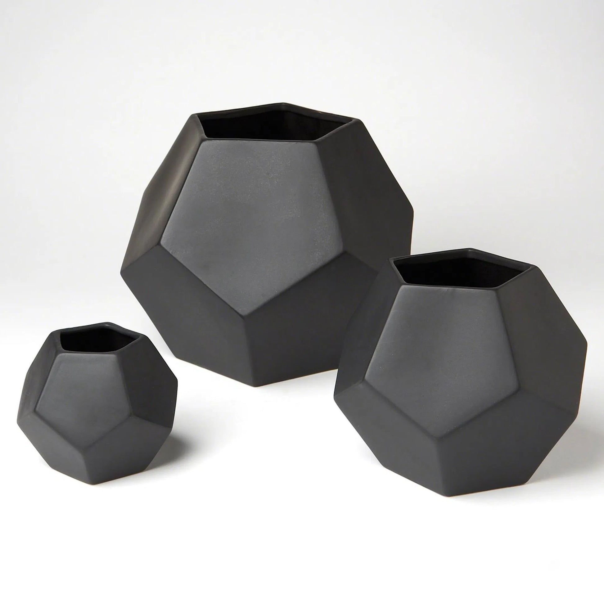 Faceted Vase by Global Views. Made from ceramic in a modern style.