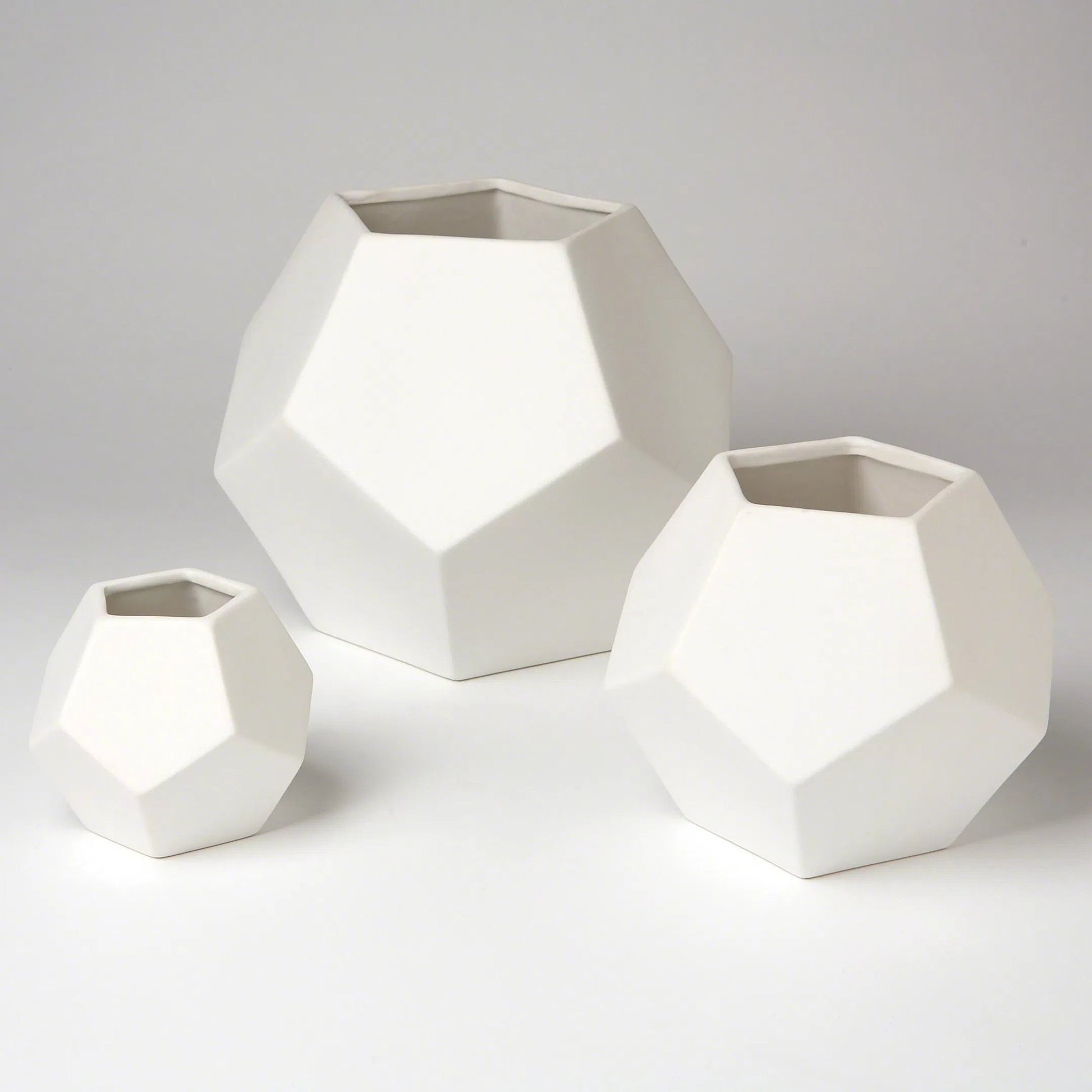 Faceted Vase by Global Views. Made from ceramic in a modern style.
