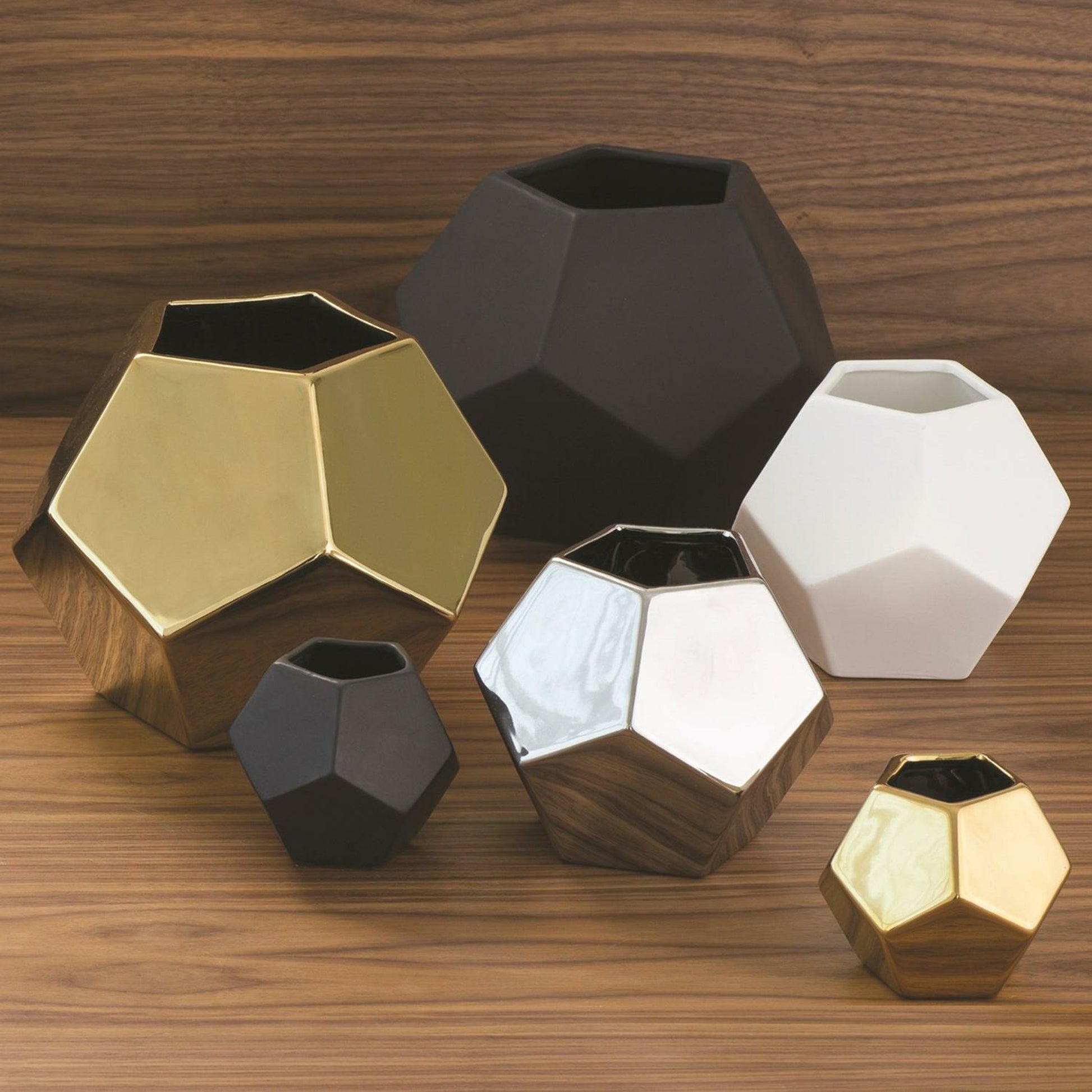 Faceted Vase by Global Views. Made from ceramic in a modern style.