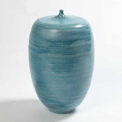 Fat Bottle by Global Views. Made from porcelain in a coastal style.