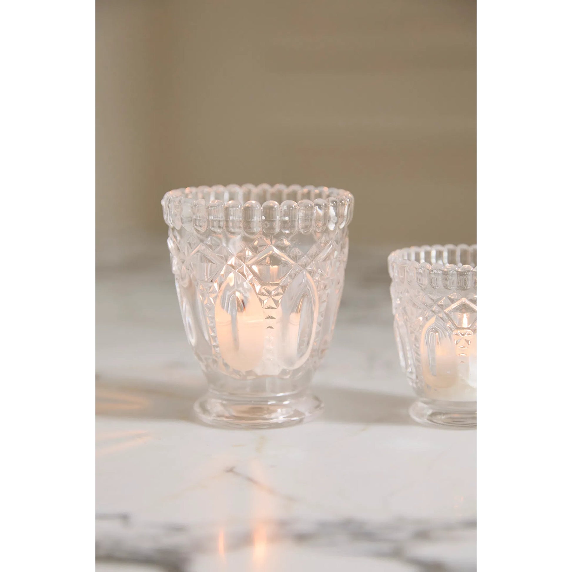 Elsie Votive 4 (Set of 4) by Accent Decor in clear. Made from glass in a unique style.