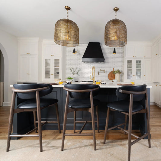 Ethan Leather Bar Stool by Regina Andrew. Made from wood in a traditional style.