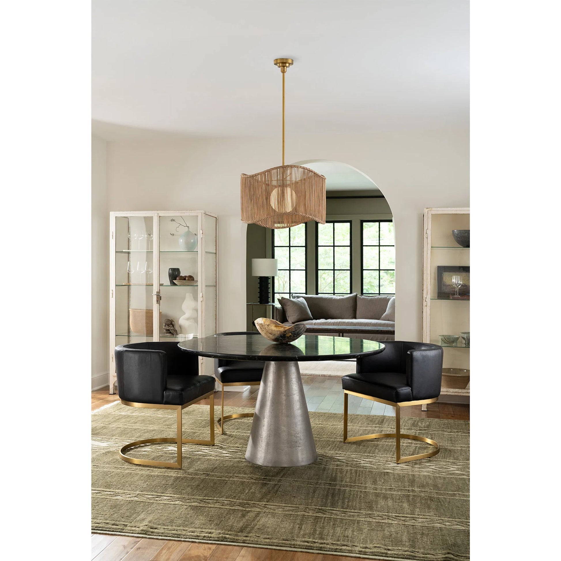 Owen Leather Counter Stool by Regina Andrew in black. Made from leather in a traditional style.