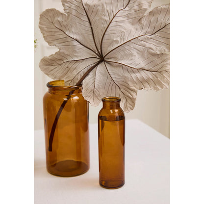 Amber Billie Bottle by Accent Decor in amber. Made from glass in a unique style.
