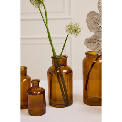 Amber Billie Bottle by Accent Decor in amber. Made from glass in a unique style.