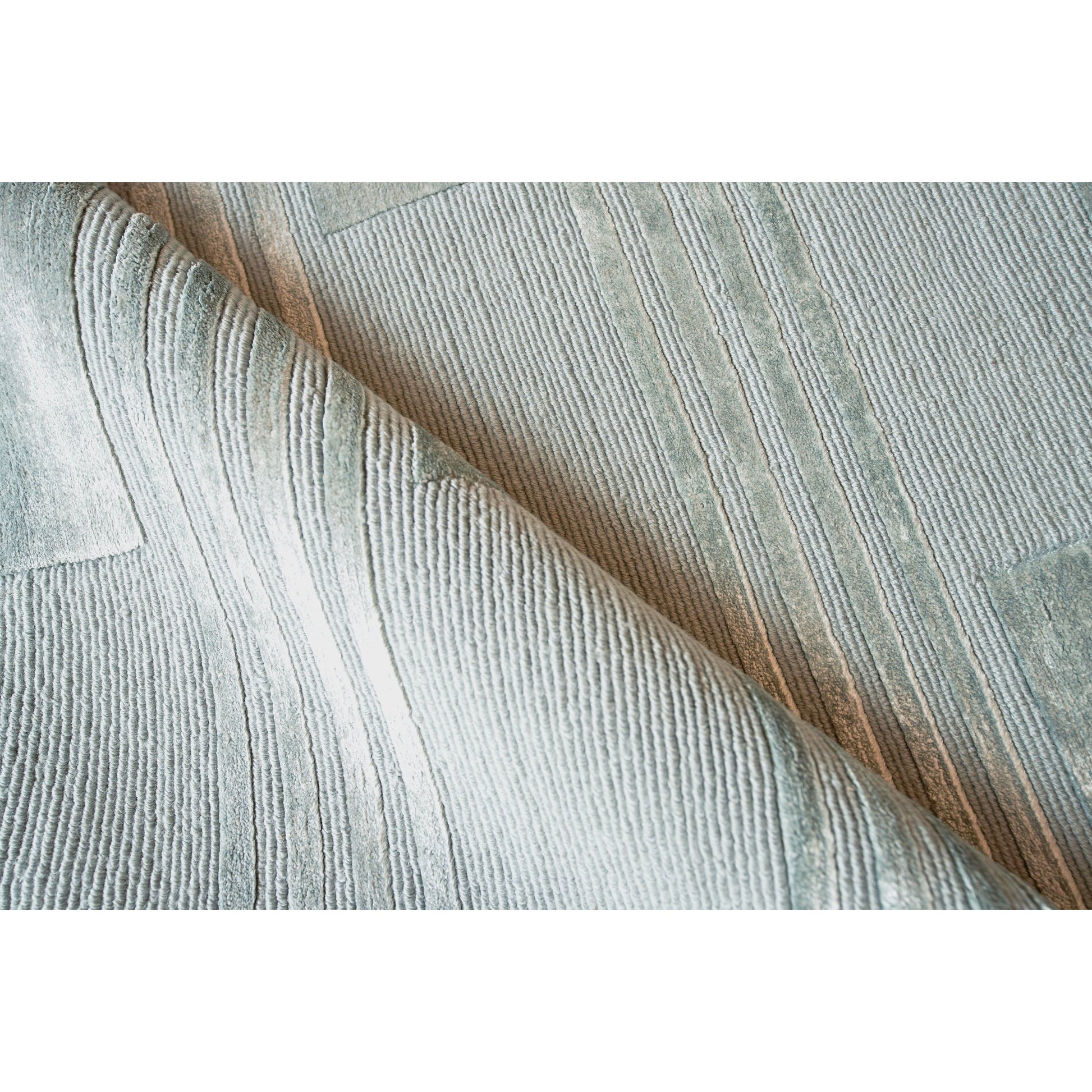 Metro Velvet Rug - Blue by Exquisite Rugs in blue. Made from wool, viscose in a unique style.