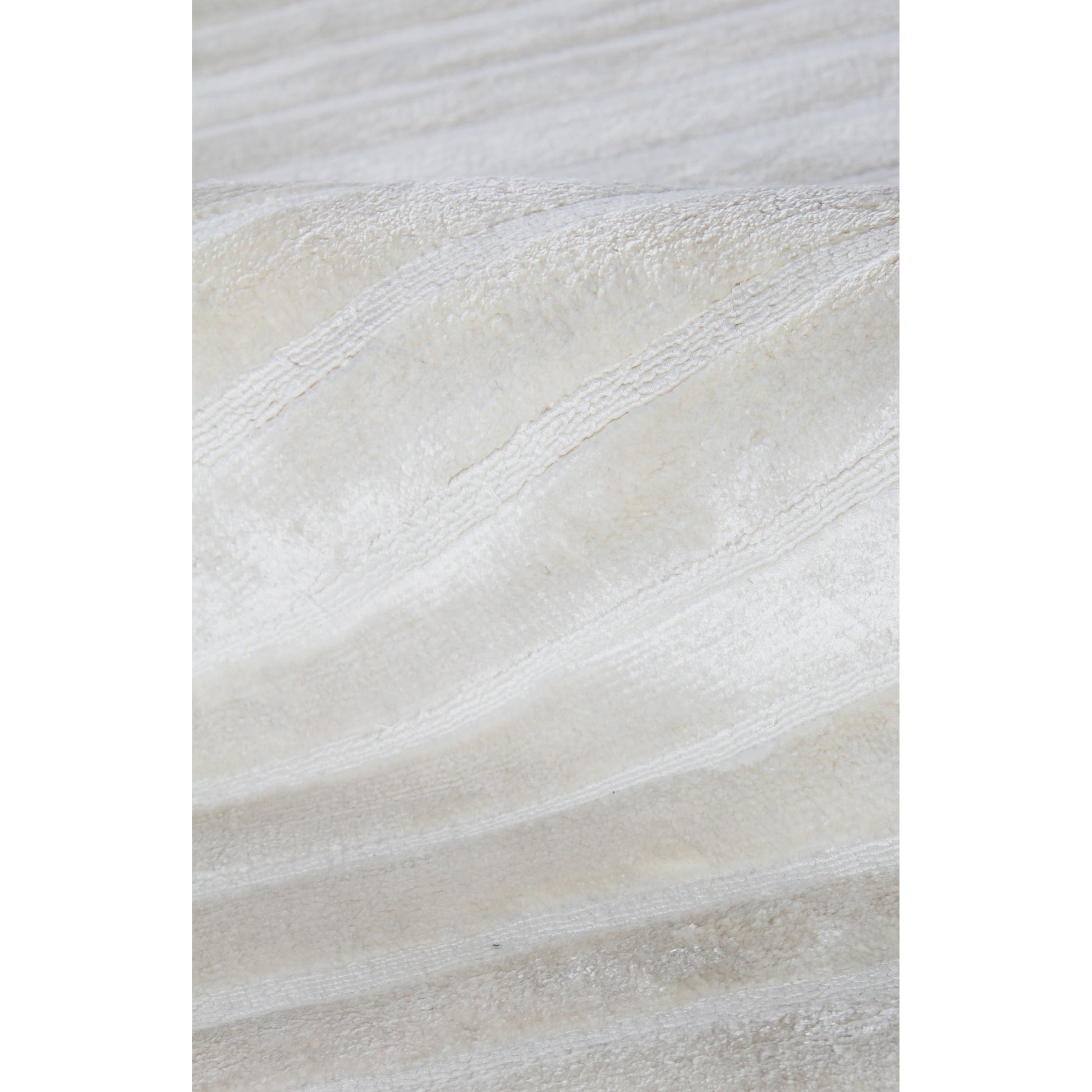 High Low Rug - White by Exquisite Rugs in white. Made from viscose in a unique style.