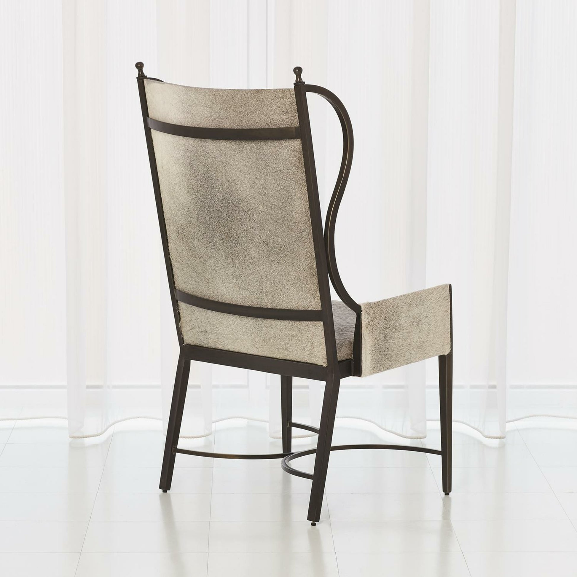 Iron Wing Chair with Grey Hair by Global Views. Made from iron in a modern style.