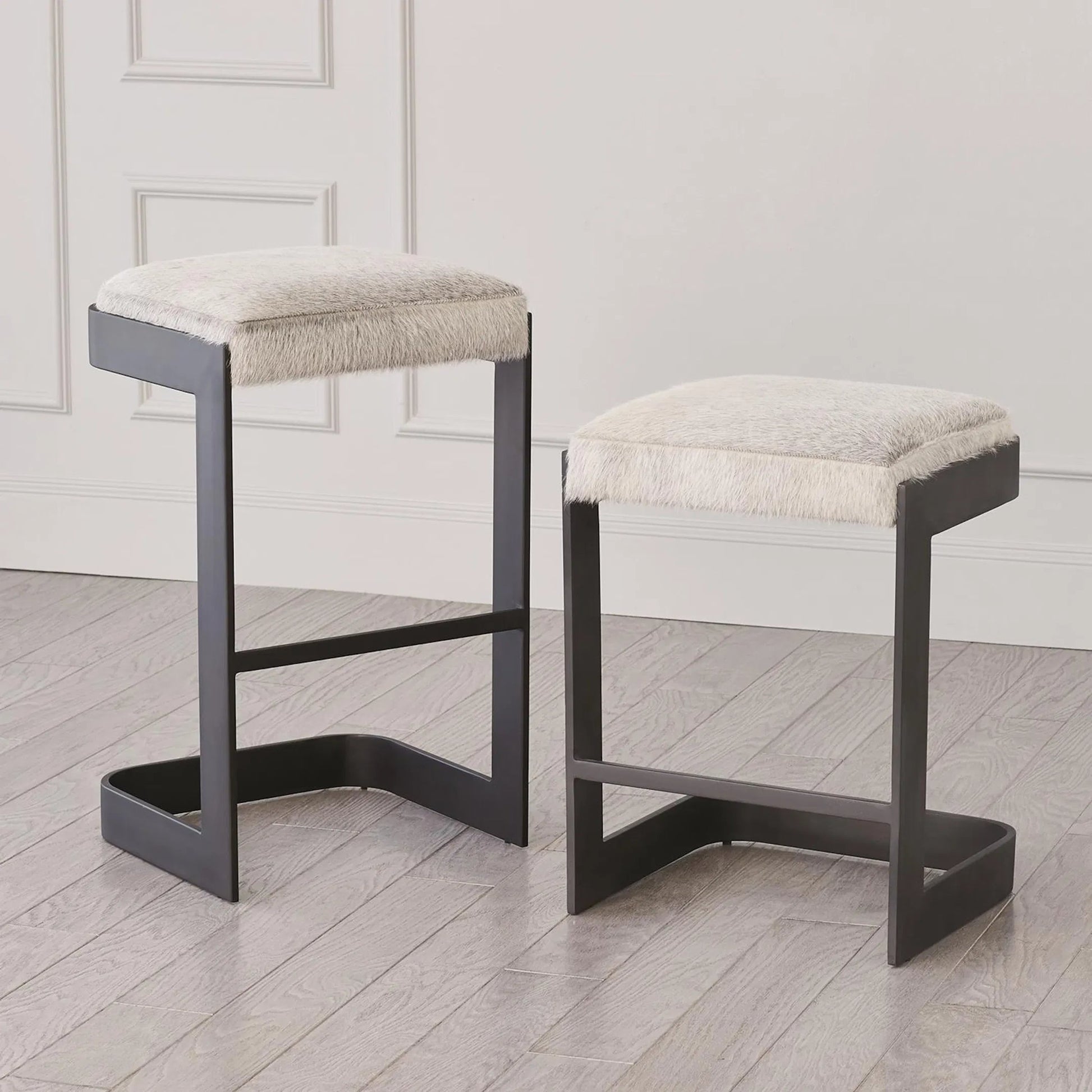 Regan Low Bar Stool with Grey Hair by Global Views. Made from iron in a modern style.
