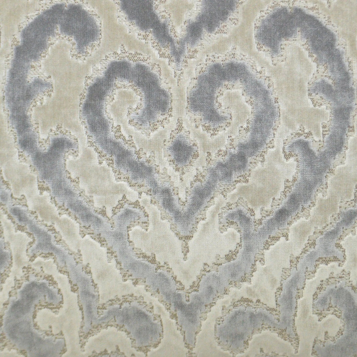 002 SI-2382254 | Closeup | Sirocco Pillow by DV Kap Home in grey. Made from 50% viscose, 35% polyester, 15% cotton in a traditional style.
