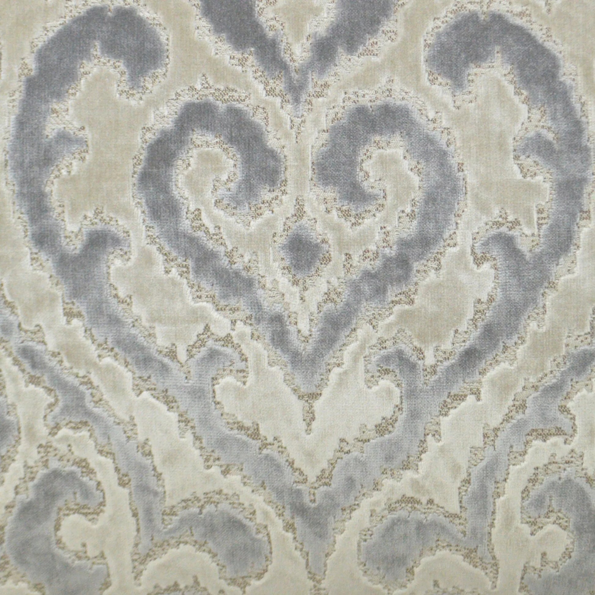 Sirocco Pillow by DV Kap Home in grey. Made from 50% viscose, 35% polyester, 15% cotton in a traditional style.
