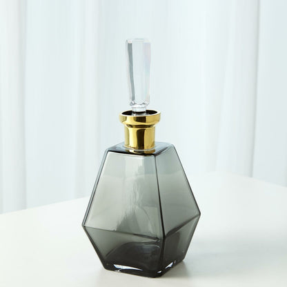 Cone Decanter by Global Views. Made from glass in a transitional style.