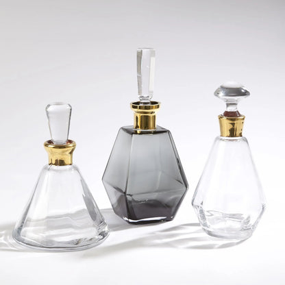 Cone Decanter by Global Views. Made from glass in a transitional style.