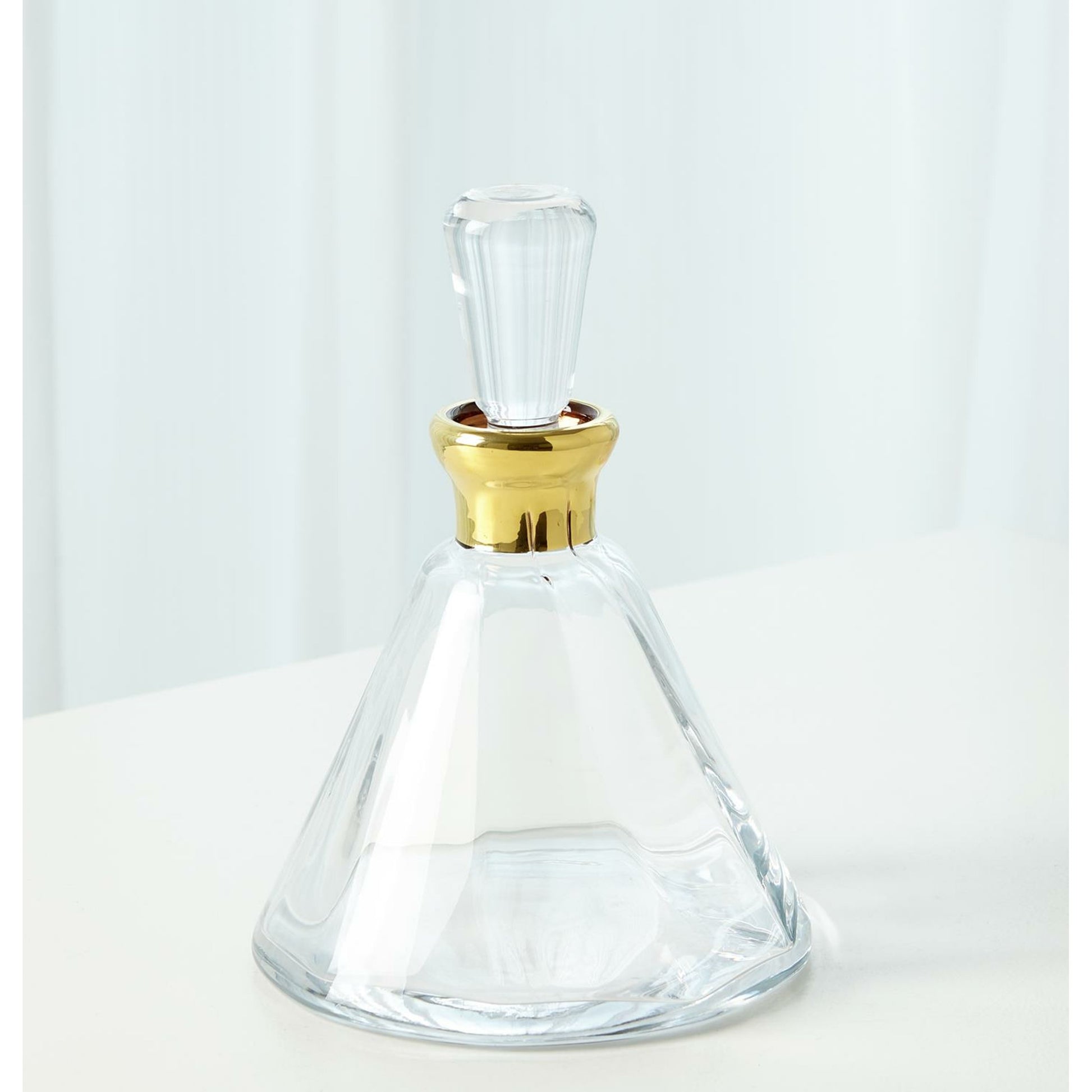 Cone Decanter by Global Views. Made from glass in a transitional style.