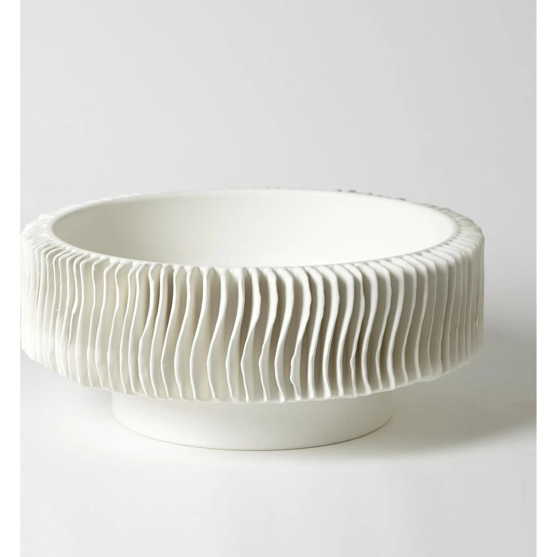 Radiator Vase by Global Views. Made from ceramic in a coastal style.